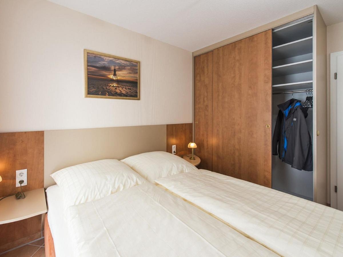 Haus Duenenglueck Whg. 23, Teilseesicht Cuxhaven Esterno foto
